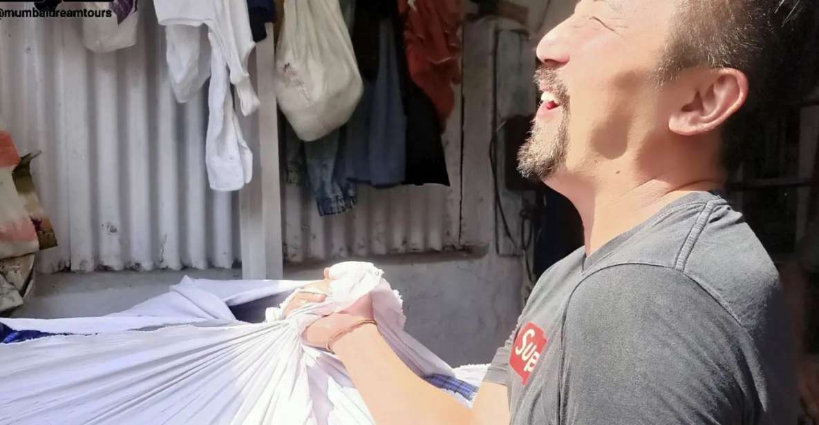 Mumbai: Dhobi Ghat Tour with Dharavi and Train Ride Options - What your guided walk looks like at the laundry